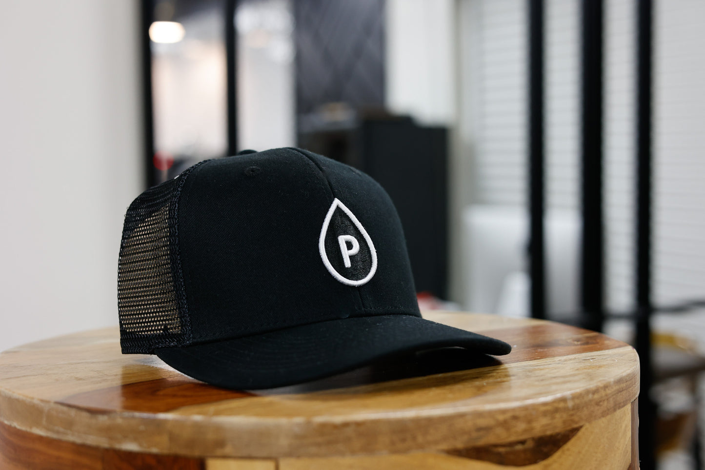 Black Out - Pumphouse Embroidered Trucker Hat